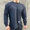 Ropa de Fitness de Manga Larga Holgada para Entrenamiento de Otoño e Invierno Ropa de Fitness para Hombre con Dobladillo Curvo Estilo Europeo y Americano Top de Running Sudoración Fitness