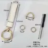 Exquisito Colgante Llavero de Cuero para Coche Accesorio de Bolso, Parche de Cuero Personalizado y de Moda Blanco y Negro Llavero de Nicho al por Mayor