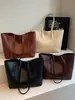 Bolso tote de mujer más vendido transfronterizo, gran capacidad, nuevo modelo 2026, bolso de hombro simple para el día a día, adecuado para ir de compras y al trabajo, bolso de axila