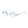 Gafas de sol retro ovaladas sin montura estilo europeo y americano para mujer, hacen que la cara se vea más pequeña, gafas de sol negras de moda casual estilo europeo y americano con protección UV