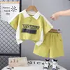 Novas Camisetas Infantis Masculinas de Manga Curta com Blocos de Cor Bonitos Camisas Polo Casuais Masculinas Fatos Raglan Infantis de Tamanho Pequeno e Médio