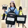 Mochila Escolar para Estudiante Invierno Nuevo Juego de Cinco Piezas Estudio Propio Tutoría Ropa de Trabajo Bolso de Mano de Gran Capacidad Mochila Casual de Moda