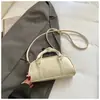 2026 Nuevo Modelo Bolso de Hombro Texturizado de Color Sólido de Moda Elegante para Mujer Bolso Boston de Moda Bolso Cruzado de Moda