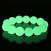Pulsera luminosa pulsera de piedra fluorescente de imitación joyería de perlas luminosas para hombres y mujeres pulsera luminosa de la suerte estilo simple de pareja