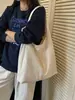 Bolsa tote de design transfronteiriço para mulheres, novo modelo primavera/verão 2026, bolsa de ombro de grande capacidade, bolsa de ombro moderna e de alta qualidade