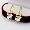 Arco del Triunfo Cuadrado Dorado Plato Aretes Calados Collar para Mujer Lujo Accesible Diseño de Nicho Traje Estéreo de Alta Gama para Mujer