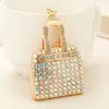 Estilo de Moda de Lujo Ligero Europeo y Americano Mini Bolso de Mano Completamente Cubierto de Diamantes Colgante para Llavero Diseño de Nicho Accesorio para Bolso de Mujer