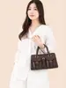 Bolso de Mano Vintage para Mujer 2026 Nuevo Modelo Gran Capacidad Bolso Cruzado Hebilla de Cinturón de Cuero Marrón Decoración Bolso Boston Bolso de Hombro Único para Viajar
