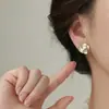 Pendientes de Flor de Camelia Modelo Nuevo 2026 Venta Caliente Nicho Gama Alta Pendientes Frescos y Dulces Joyería Ligera de Oreja para Mujeres
