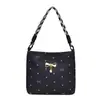 Bolso de mano estilo coreano con lazo y diseño de lunares, un mini bolso dulce y genial en forma de media luna que se puede llevar en la mano o usar como bolso cruzado