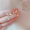 Pendientes de perlas estilo coreano, pendientes de alta gama, temperamento personalizado, estilo Hong Kong, pendientes retro, lujo ligero, estilo Hong Kong, textura atmosférica.