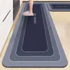 Alfombrilla de suelo de tierra de diatomeas estilo nórdico minimalista transfronteriza, resistente a la suciedad y fácil de limpiar, alfombrilla de cocina, juego de dos piezas de tira larga, alfombrilla para pies de cocina