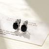 Aretes Elegantes de Lujo Ligero Europeo y Americano de Alta Gama con Zirconia Incrustada en Forma de Huevo Diseño Nicho Transfronterizo Aretes de Aro para Mujer
