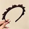 Faixa de cabelo simples para lavar o rosto na cor preta para mulheres, estilosa e moderna, projetada para fazer o rosto parecer menor, adiciona um toque de ambiente