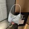 Bolsa Pequena de Mão Elegante com Laço Feminina 2026 Estilo Coreano Nicho Bolsa de Mão Nuvem Bolsa de Ombro Único Transversal Fashion