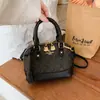 Bolso de mujer de alta gama 2026 nuevo modelo versátil bolso tipo concha estampado, elegante y con estilo, colores contrastantes, bolso de hombro y cruzado vintage