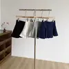 Saia Cinza Estilo Novo 2027 para Mulheres, Saia de Verão Anti-Exposição com Babados, Saia Curta Versátil e Fashion de Cintura Alta em Linha A