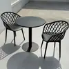 Juego pequeño de mesa y sillas redondas de acero al carbono simple para ocio en balcón, mesa de discusión, área de descanso, mesa de comedor para cafetería de té con leche al aire libre