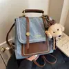 Mochila vintage para mujer transfronteriza, bolsa escolar casual de nicho para estudiantes, mochila de viaje ligera de alta calidad y moderna