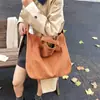 Bolsa de Lona Elegante da Moda Feminina Outono e Inverno 2025 Nova Bolsa de Mão de Grande Capacidade Bolsa Tote Ombro para Estudante e Comutador