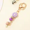 Popular Llavero de Silicona con Cuentas Cruzadas de Margarita Cadena para Bolso de Mujer Colgante de Girasol Accesorios Pequeños DIY