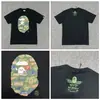 Camiseta de manga corta de marca de moda co-branded PE, unisex, estampado de camuflaje, camiseta de manga corta de corte holgado de alta gama