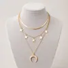 Moda popular europea y americana en joyería transfronteriza colgante de oblea de cuerno collar de cuentas multicapa femenino fabricante en stock
