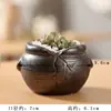 Collar pequeño especial creativo hecho a mano maceta cerámica suculenta pequeña fresca planta carnosa maceta cerámica artesanías al por mayor