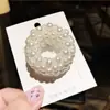 Versión coreana de anillo para el pelo de perlas de imitación accesorios para el cabello Famoso en Internet goma para moño de bola pelo banda elástica para el pelo niña linda cuerda para el pelo de alta elasticidad venta al por mayor