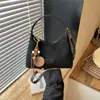 Bolso de media luna minimalista transfronterizo 2026 nueva versión coreana, bolso de axila, bolso de hombro de moda estilo relajado, bolso cruzado casual