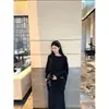 Nueva colección de otoño elegante de alta calidad adelgazante figura irregular favorecedora murciélago manga larga traje negro