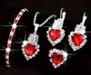 Conjunto de quatro peças estilo europeu e americano com colar, brincos e anel de cristal azul claro em formato de coração cravejado de diamantes - uma coleção transfronteiriça para mulheres