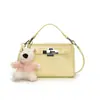 Bolsa Quadrada Pequena Portátil Simples de Alta Qualidade Nova Moda Tendência Nicho Primavera Verão 2025 Bolsa Transversal de Ombro Casual Feminina