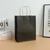 Vendas diretas de fábrica: sacolas de papel kraft feitas sob medida, incluindo sacolas de compras (tote bags), sacolas de presente para o Festival do Meio Outono e sacolas de embalagem para viagem de café/bebidas, disponíveis para atacado