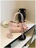 Bolso de Mano Pequeño Estilo Nuevo 2026 con Patrón de Lichi Simple para Mujer, Bolso Cubo de Piel Suave de Alta Gama, Bolso Cruzado Versátil para Principios de Primavera