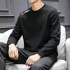 Camiseta casual versátil de manga larga para hombre para otoño, cuello redondo, color liso moderno, cómoda, transpirable y de corte holgado.