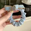Nudo para el pelo de mezclilla clara con textura retro, versátil, duradero y no dañino, cuerda para el pelo, accesorio para el pelo para mujer