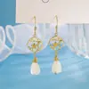 Pendientes de flor de magnolia con concha blanca para mujer, estilo chino vintage, estilo chino nuevo, pendientes de alta gama, pendientes de moda para Hanfu y falda Ma Mian