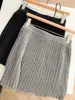 Falda plisada de punto gris estilo universitario para mujer petite, falda corta de línea A, nueva falda de medio cuerpo versátil de cintura alta para otoño e invierno