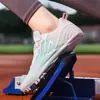Zapatillas de Clavos para Atletismo para Estudiantes Masculinos y Femeninos, Competiciones Juveniles de Carreras de Velocidad, Examen Físico y Entrenamiento Zapatos de Clavos
