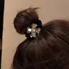 2025 nuevo Corea del Sur de alta gama网红 de Internet flor de cuatro hojas diamante anillo para el pelo para mujer coleta cuerda para el pelo bolas atar cabeza banda de goma accesorios para el pelo