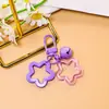 Exquisito y novedoso colgante de doble estrella de cinco puntas, un llavero dulce y femenino, perfecto como accesorio para parejas o mejores amigos para bolsos, y una decoración DIY
