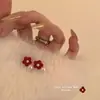Pendientes de flocado rojo de otoño e invierno, pendientes de flor de terciopelo rojo para mujer, perlas, explosiones de Año Nuevo, pendientes de alta gama para Año Nuevo