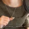 Collar colgante de girasol con ojo de tigre vintage de Melard, una cadena para suéter elegante y con estilo con un toque de lujo y sofisticación