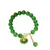 [Venta al por mayor directa de fábrica] Nuevo estilo chino Imitación Jade Dongling Puesto de Exhibición de Feria de Templo del Mercado Nocturno Pulsera de Vidrio Joyería Más Vendido