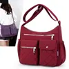 Bolsa transversal de nylon de grande capacidade, novo estilo para mulheres, bolsa de ombro popular para mulheres de meia-idade, bolsa casual para mães, bolsa de tecido 2026