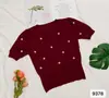 Senso de Design Pequeno Popular na Internet Popular Super Quente Suéter de Manga Curta 2025 Novo Roupa de Verão Feminina Top Curto Slim