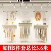Estante de exhibición de pared para tienda de ropa simple estante de exhibición de perchas de pared para tienda de ropa de mujer Barra de perchas para ropa de niños