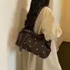 Bolso de hombro de gran capacidad con estampado de lunares texturizado estilo occidental, nuevo modelo de moda otoño 2026, simple, versátil, de alto valor