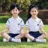 Trajes de actuación para coro infantil para el Día del Niño, graduación de jardín de infantes, porras de escuela primaria y actuaciones del día del deporte